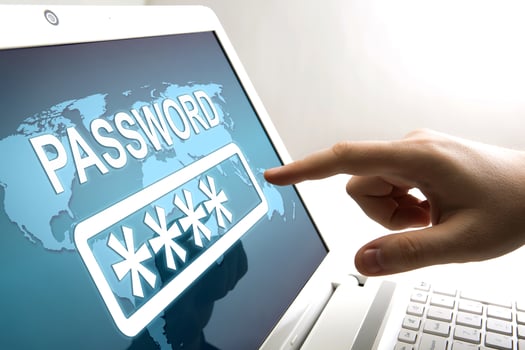 human fingers on the notebook screen and network authorization photo