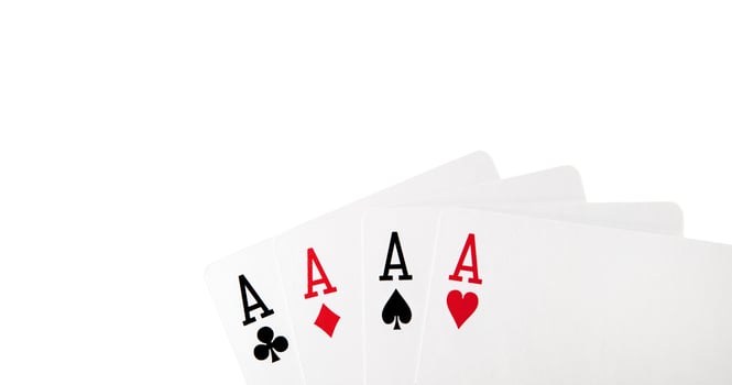four cards with aces on white background photo
