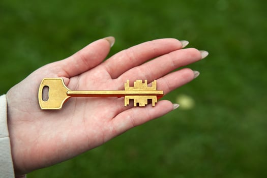 handing the key to new housing photo