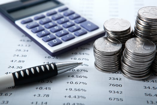 stacks of Russian rubles with calculator and pen photo