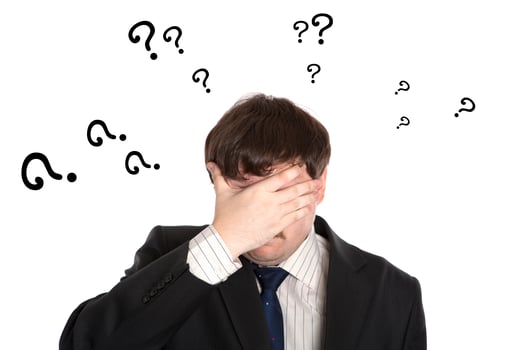 businessman in stress with questions photo