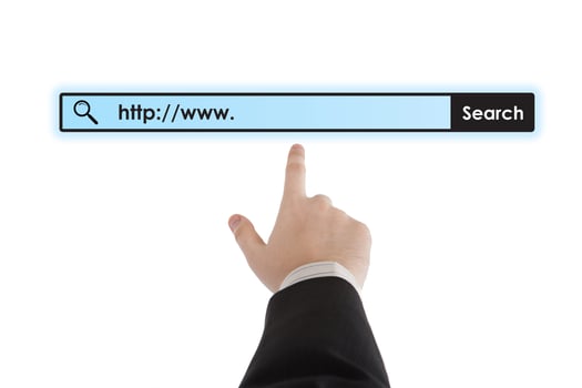 man's hand clicks on the address bar photo