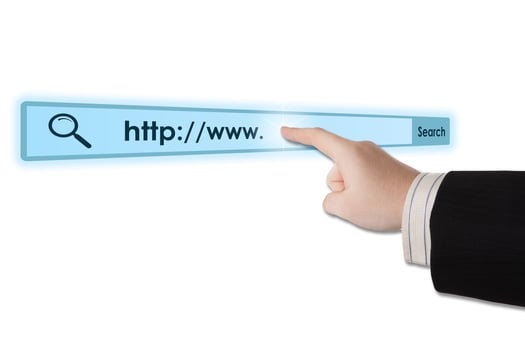 man's hand clicks on the address bar photo