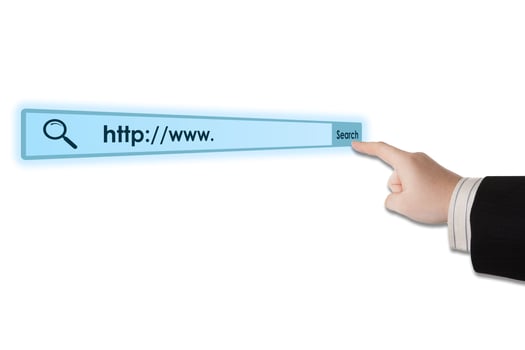 man's hand clicks on the address bar photo
