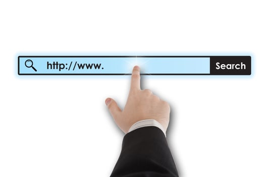 man's hand clicks on the address bar photo