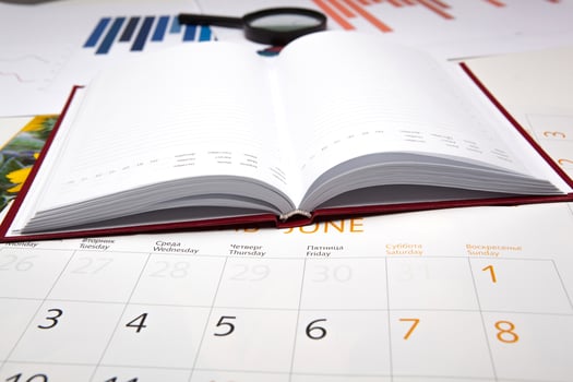 business diary with calendar and diagram photo