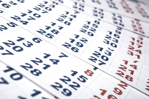 sheets of wall calendar with the number of days photo