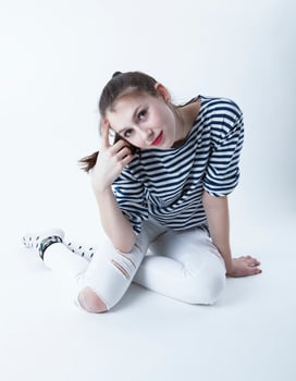young girl on grey photo