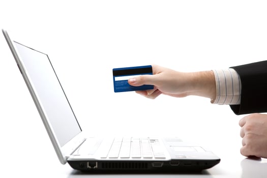 Credit card in hand when you pay photo