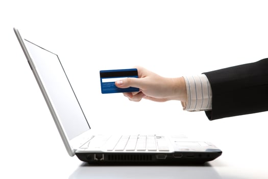 Credit card in hand when you pay photo