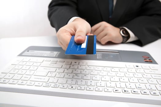 Credit card in hand when you pay photo