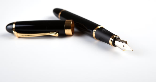 fountain pen on white flatness photo