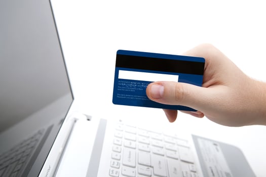 Credit card in hand when you pay photo