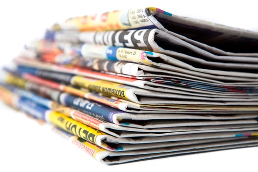 stack of newspapers close-up photo
