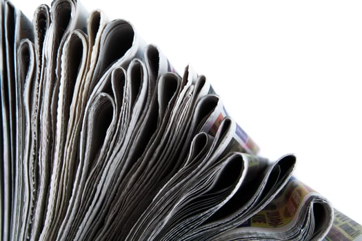 stack of newspapers close-up photo