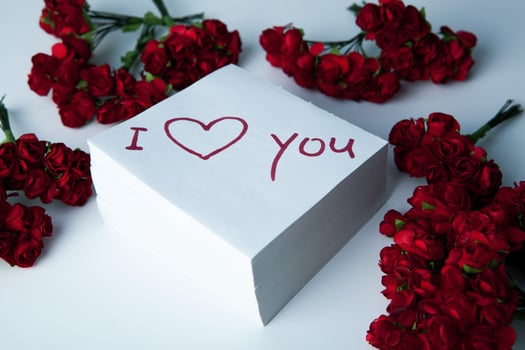 notebook with marker inscription I love you and roses photo