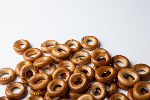 a bunch of bagels on a white background photo