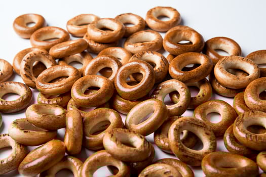 a bunch of bagels on a white background photo