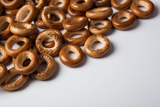 a bunch of bagels on a white background photo