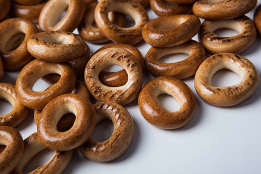 a bunch of bagels on a white background photo