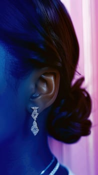 Dramatic Close Up Portrait of Elegant Dark Haired Beauty with Mesmerizing Jewelry Accessories photo