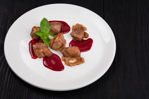 Fried pork meat with zucchini puree photo