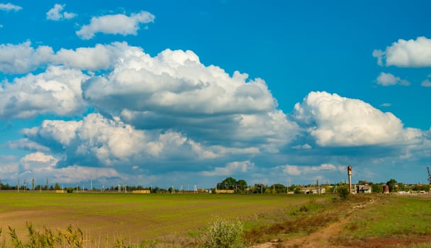 White cumulus storm clouds in the sky during the day, Ukraine photo