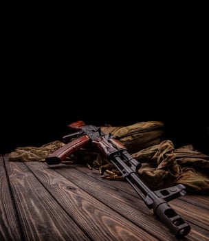 Classic Soviet AK machine gun on a wooden back. Weapons of Russia and the Soviet Union. photo