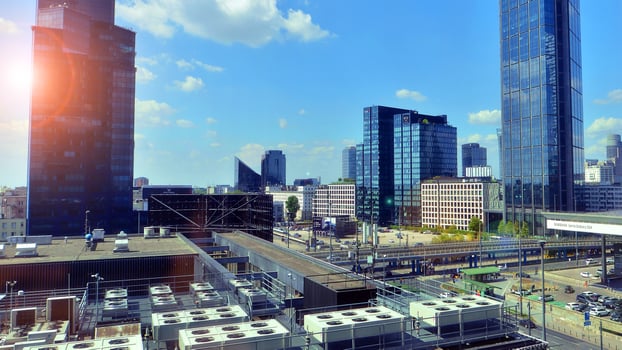 Warsaw, Poland. 17 August 2024. The center of city with skyscrapers and cars. Wide streets with cars and public transport photo
