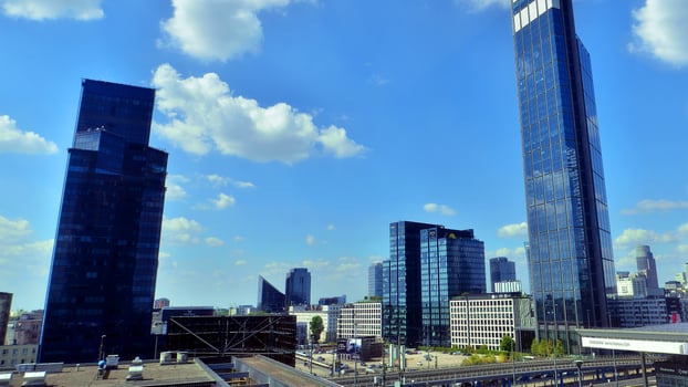 Warsaw, Poland. 17 August 2024. The center of city with skyscrapers and cars. Wide streets with cars and public transport photo