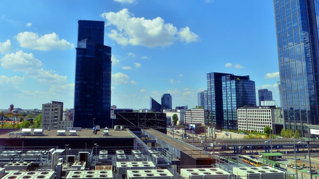 Warsaw, Poland. 17 August 2024. The center of city with skyscrapers and cars. Wide streets with cars and public transport photo