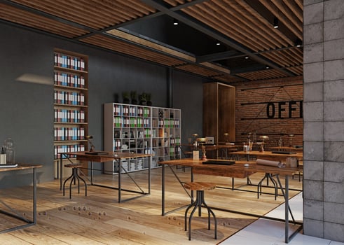 open office space with wooden floors and brick walls photo