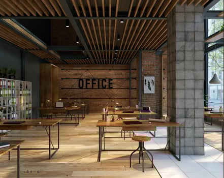 open office space with wooden floors and brick walls photo