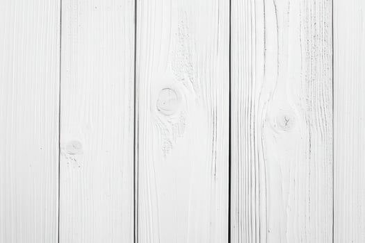 White wood planks showing detailed texture in a bright setting photo