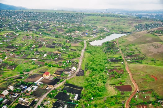 RUSSIA, krasnoyars - 2020 Aerial view of cottages near the big wood photo