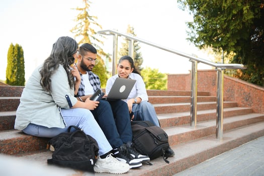Cheerful Indian asian young group of college students or friends together photo