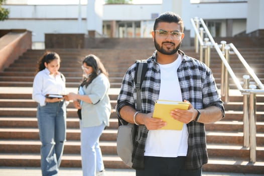 Cheerful Indian asian young group of college students or friends together photo