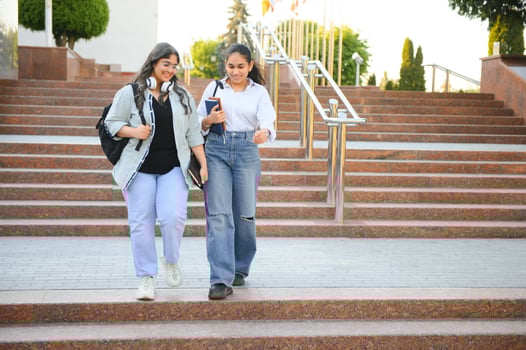 Group of smiling multiethnic near university campus photo