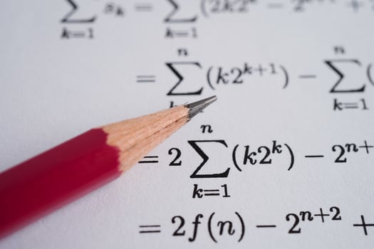 Pencil on mathematic formula exercise test paper in education school. photo