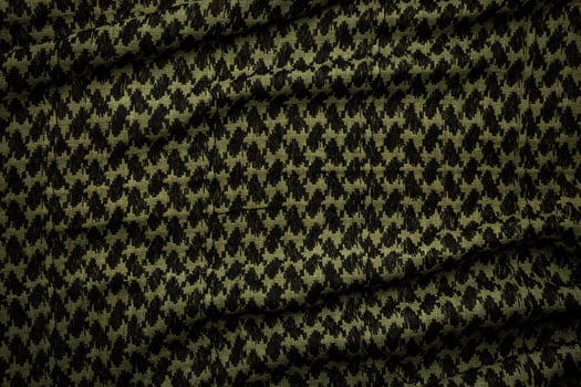 Keffieh scarf. The texture of the cotton traditional symbolic arabian scarf. Khaki back. photo