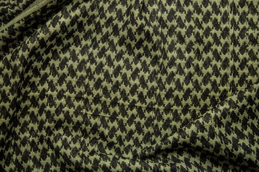 Keffieh scarf. The texture of the cotton traditional symbolic arabian scarf. Khaki back. photo
