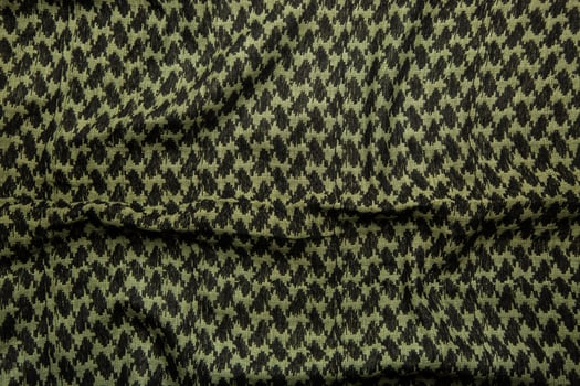 Keffieh scarf. The texture of the cotton traditional symbolic arabian scarf. Khaki back. photo