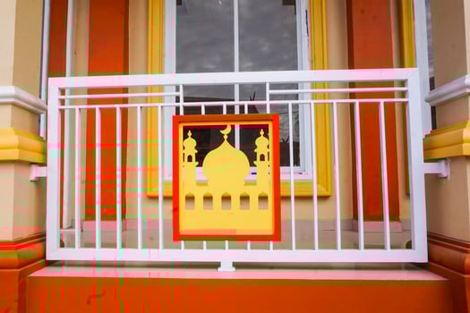 Artistic photo of a mosque wall which has the impression of Islamic religious symbols