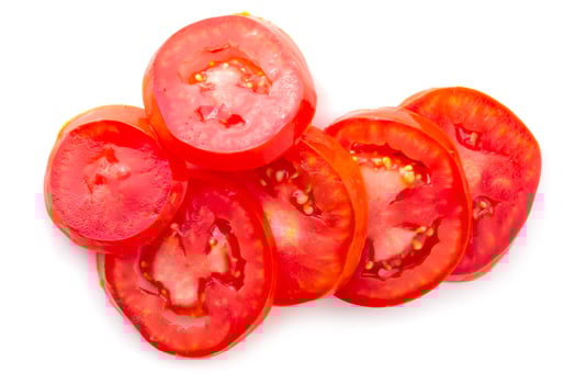 Tomato slice isolated over white background photo