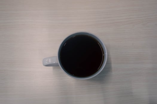 Vietnam Style Drip Coffee with Condensed Milk at the Bottom to Add Sweetness, Close Up photo