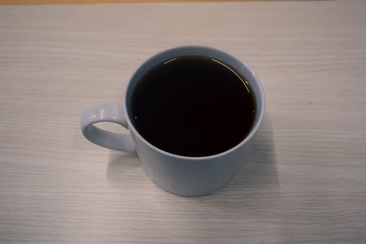 Vietnam Style Drip Coffee with Condensed Milk at the Bottom to Add Sweetness, Close Up photo