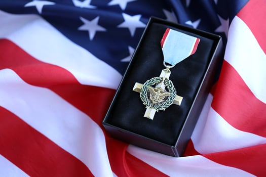 KYIV, UKRAINE - JULY 10, 2024 US Air Force Cross medal. United States military award medal with ribbon and pin. Handmade paper theater props photo