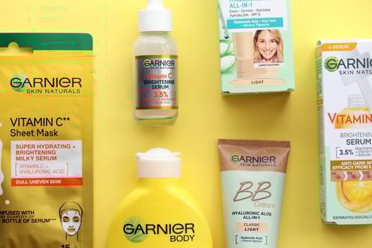 KYIV, UKRAINE - APRIL 20, 2024 Garnier production with company logo. Garnier is a mass market cosmetics brand of French cosmetics company L'Oreal photo
