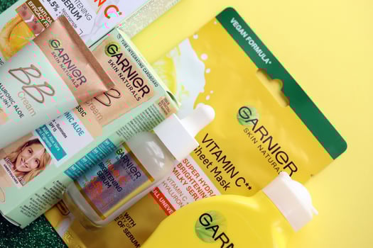 KYIV, UKRAINE - APRIL 20, 2024 Garnier production with company logo. Garnier is a mass market cosmetics brand of French cosmetics company L'Oreal photo