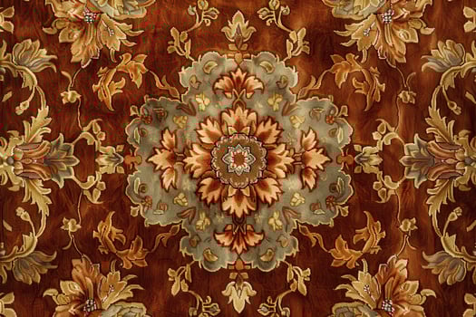 Elegant floral design with rich colors and intricate patterns showcased on fabric background photo